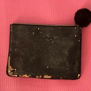 Stella & Dot wine-o clutch. Well made plenty of room for all your lovely things!